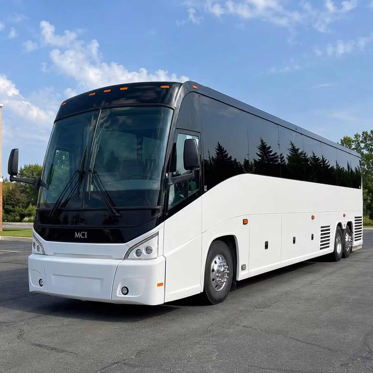 rather than splitting your group into a caravan keep everyone together on one long distance charter bus